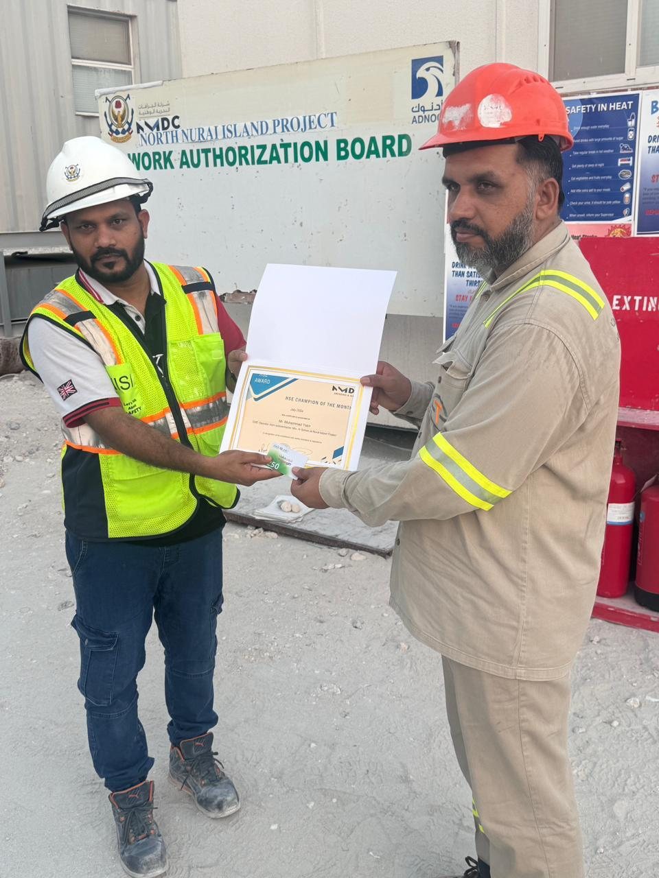 Safran crew receiving an HSE Champion award on site